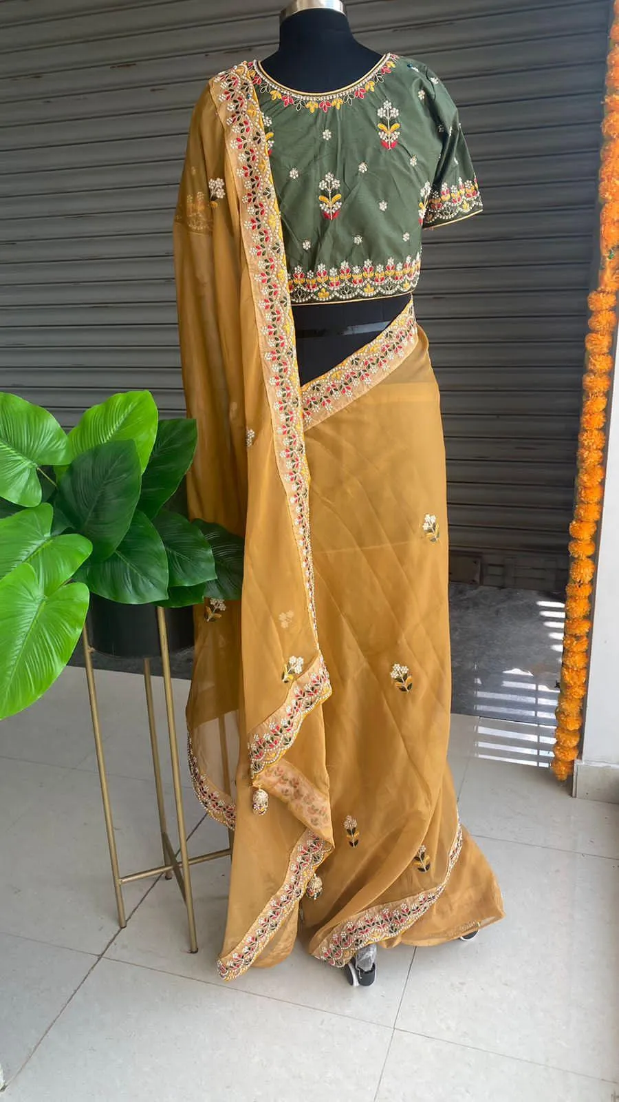 Light orange organza saree with silk embroidery blouse